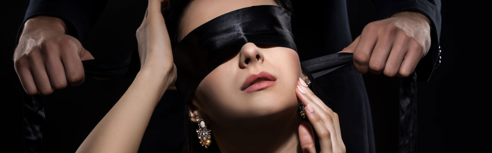 Woman wearing blindfold