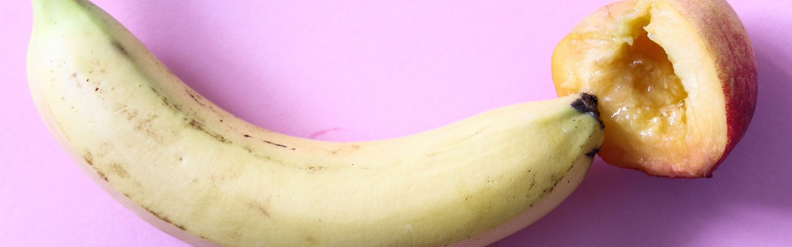 Banana and sliced peach mimicking penetration