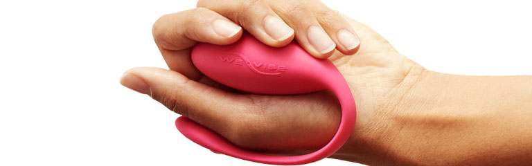 A hand clutches the We-Vibe Jive couple