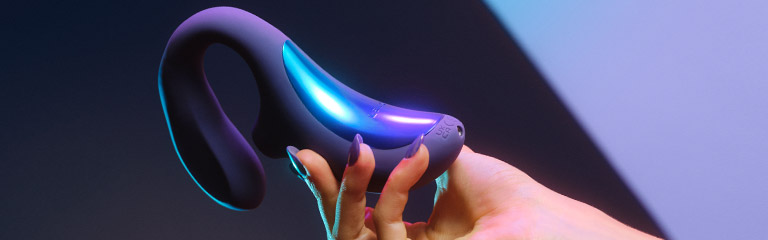The Lelo Enigma Wave Rabbit Vibrator held in a woman